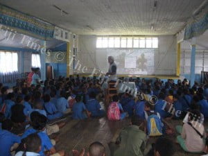 Children of Lomary Children of Lomary listen intently as Manoa Rasigatale explains why the shark is important in our lives